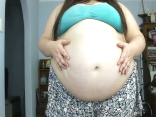 Obese Woman Bloats And Plays With Her Gigantic Belly