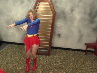 Superheroine Supergirl Captured Caged And Humiliated