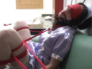 Purple Maid Blindfolded And Bound