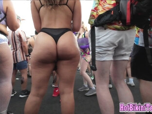 Phat ass Latina raver girl shaking her big ass cheeks at rave festival