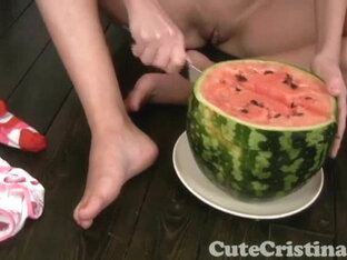 Cute Cristina plays naked with watermelon